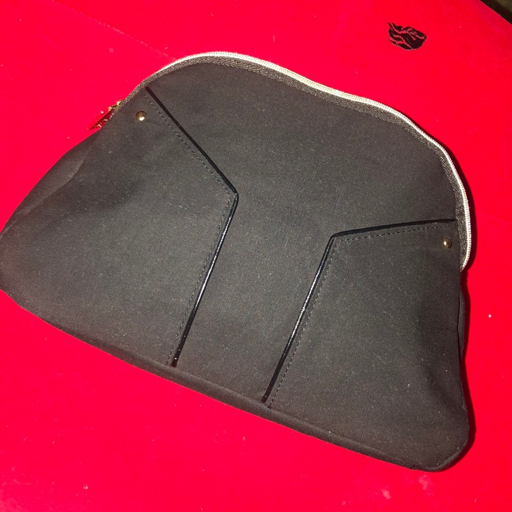 $25 NIP YSL MAKEUP OR CLUTCH BAG